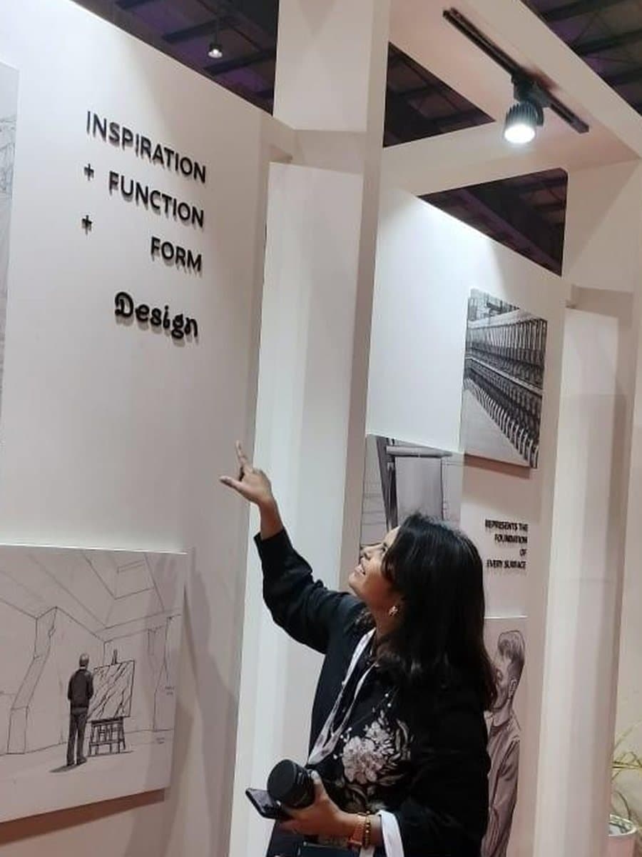 Ar. Renuka Desai, Lead at Form & Hue, at a design exhibition beneath the words Inspiration, Function, Form, Design